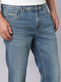 Med Blue Mid Rise Cropped Length Loose Boot Leg Stretch Jeans