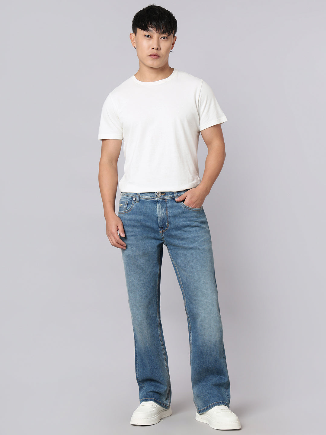 Med Blue Mid Rise Cropped Length Loose Boot Leg Stretch Jeans