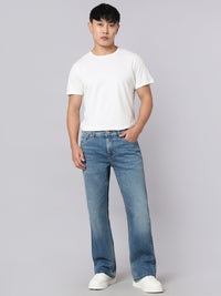 Med Blue Mid Rise Cropped Length Loose Boot Leg Stretch Jeans