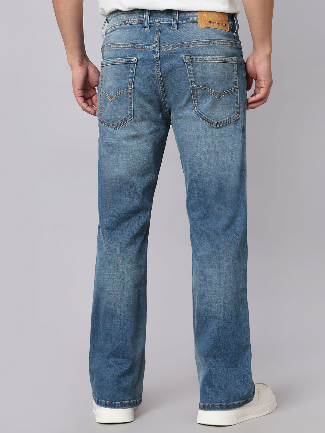 Med Blue Mid Rise Cropped Length Loose Boot Leg Stretch Jeans