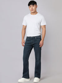 Petrol Mid Rise Cropped Length Loose Boot Leg Stretch Jeans
