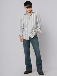 Greenish Blue Mid Rise Cropped Length Loose Boot Leg Stretch Jeans