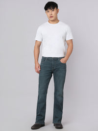 Greenish Blue Mid Rise Cropped Length Loose Boot Leg Stretch Jeans